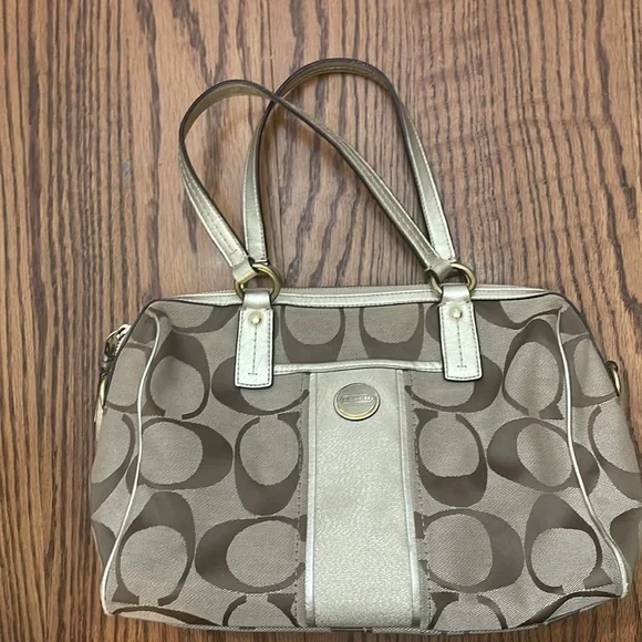 Gold coach purse